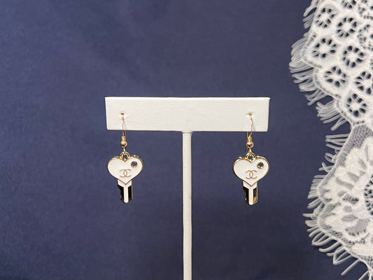 White and Gold Chanel Key Earrings